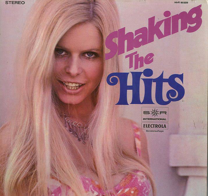 Albumcover S*R International - Shaking The Hits